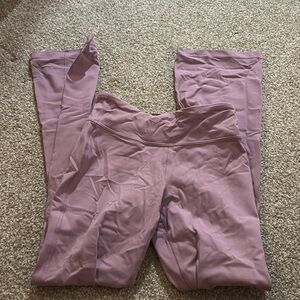 Athleta Girl pink flare leggings, size L.